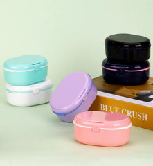 Travel-friendly denture storage box with mirror accessory