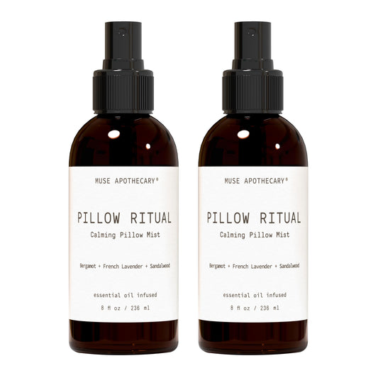 Muse Apothecary Pillow Ritual bottle resting on fabric