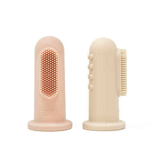 Hero image: Mushie Baby Finger Toothbrush 2-Pack in Blush and Shifting Sand