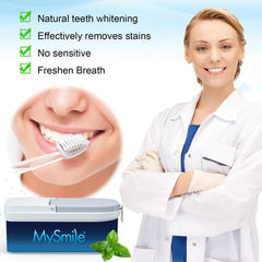 Scoop of MySmile whitening powder on a toothbrush