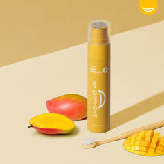Close-up of mango-flavored toothpaste texture