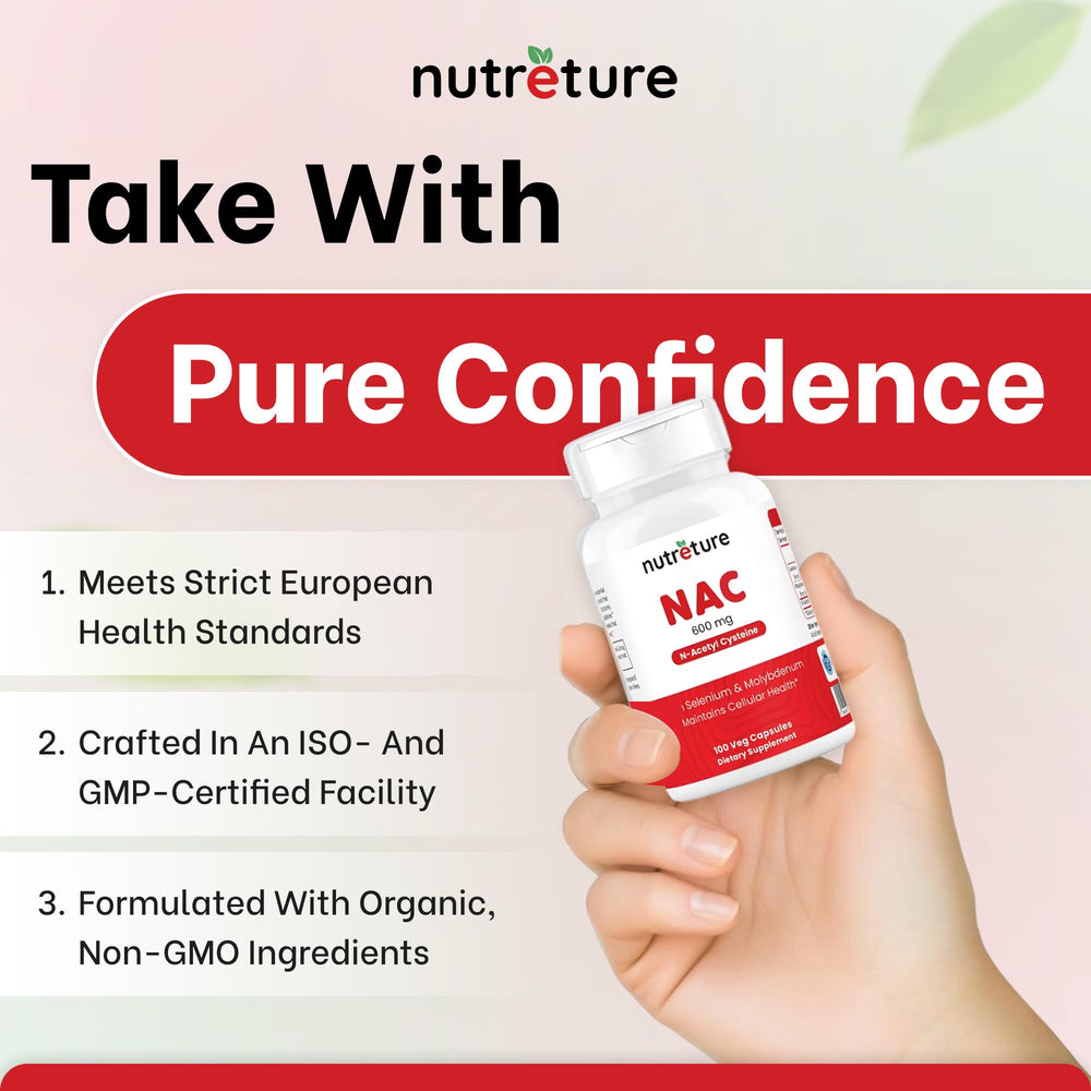 Capsules spilled with scoop beside bottle