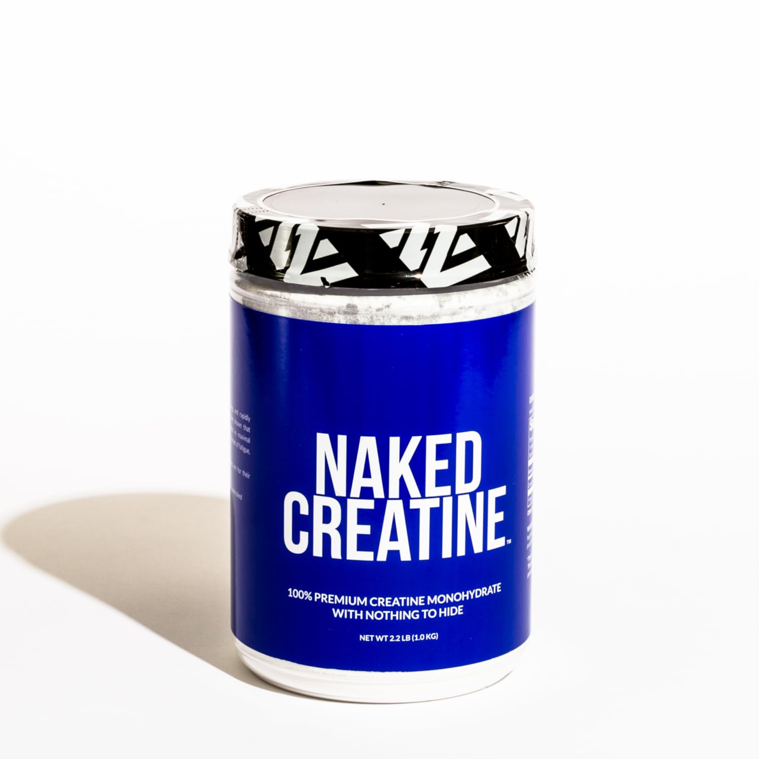 Serving scoop of Naked Creatine Monohydrate for workouts