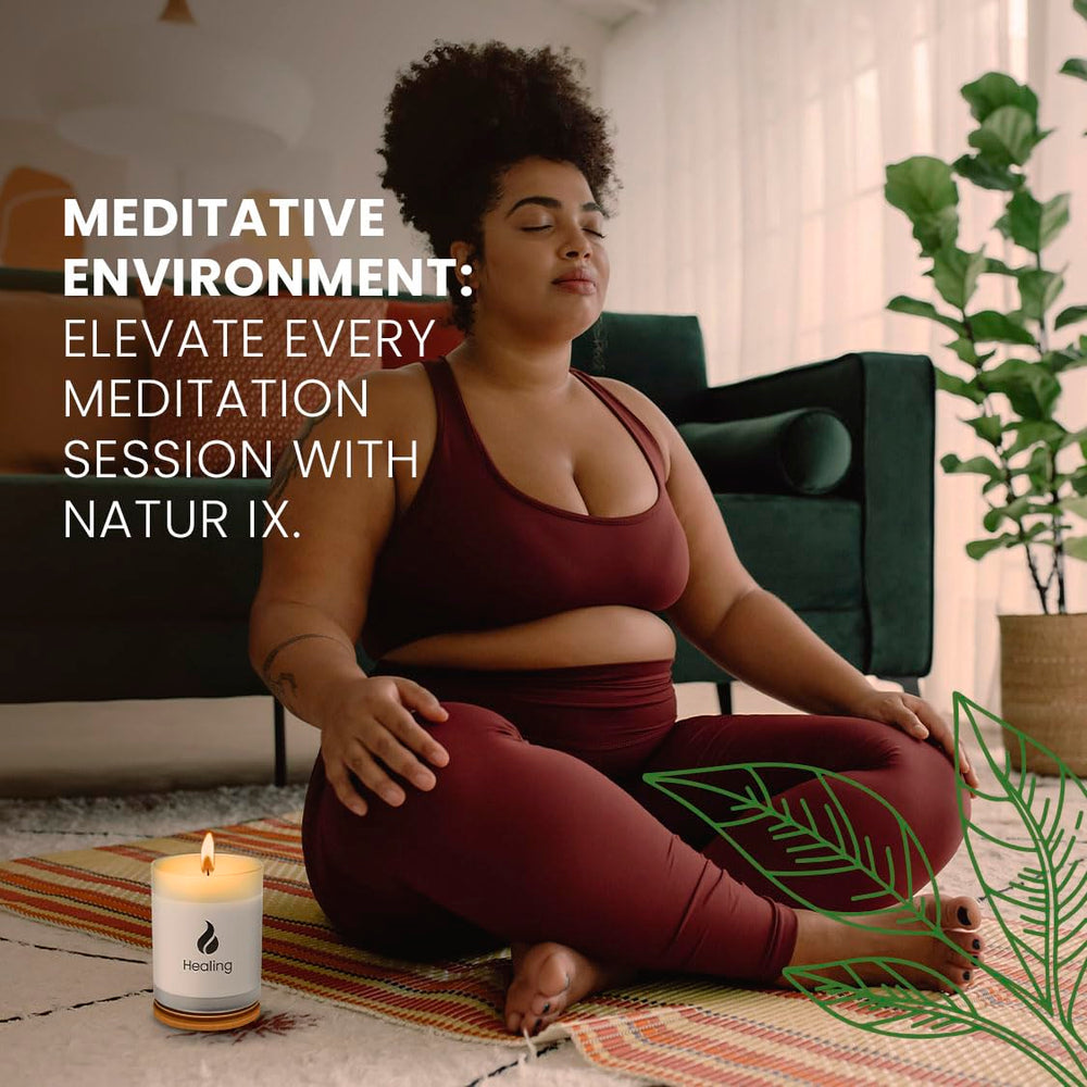 Sage leaves and Palo Santo fragments near candle