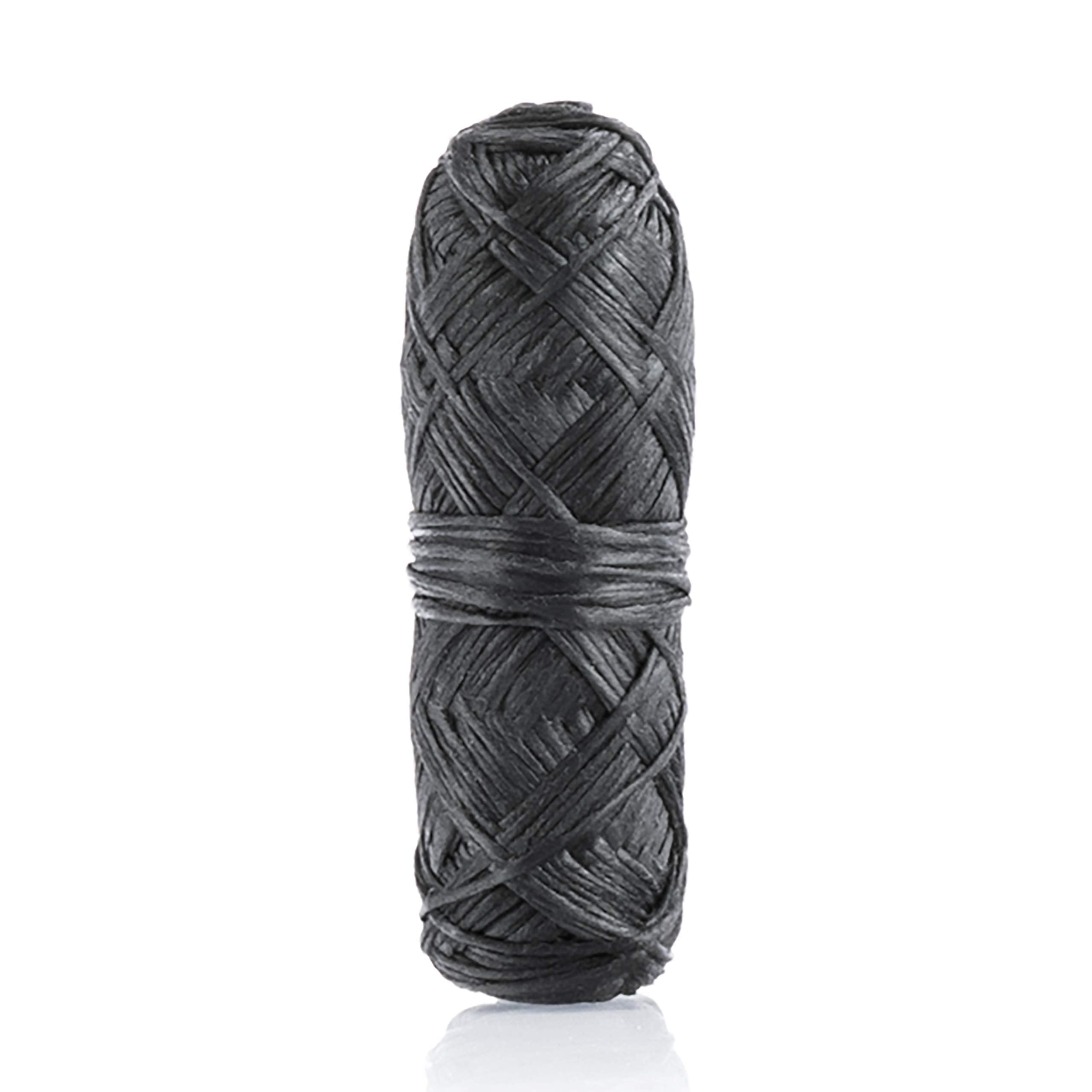 Lifestyle shot of person flossing with bamboo charcoal floss