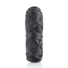 Lifestyle shot of person flossing with bamboo charcoal floss