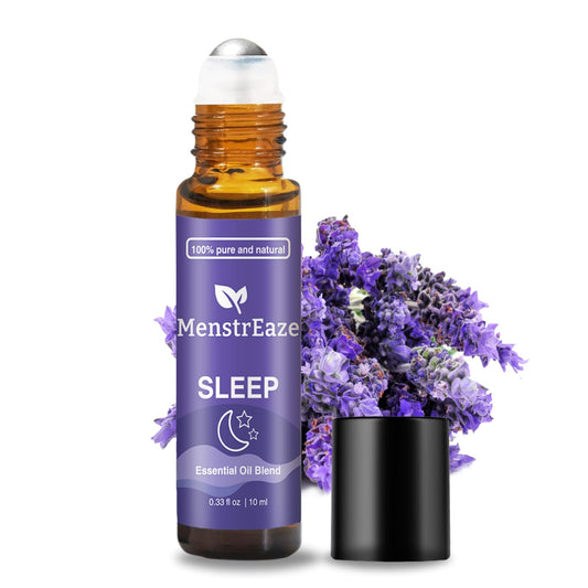 Natural Sleep Essential Oil Roll-On bottle with lavender and chamomile on a soft background