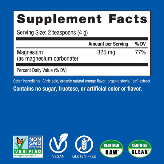 Spoon scooping CALM orange magnesium drink mix powder