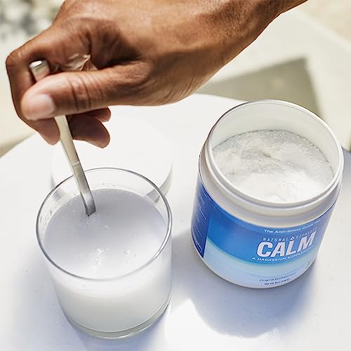 Prepared orange CALM magnesium drink in a glass