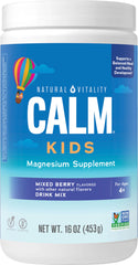 Natural Vitality CALM Sleep mixed berry magnesium drink mix powder in a glass
