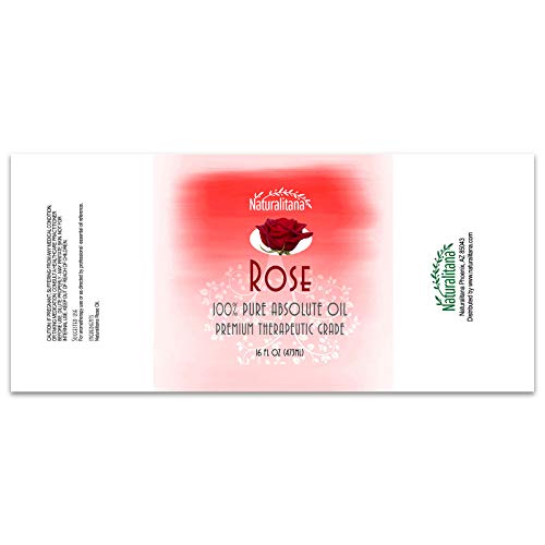 Diffuser with rose essential oil aroma in a cozy winter setting