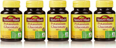 Close-up of Nature Made Potassium Gluconate 550mg tablet