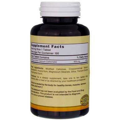 Close-up of 600 mg calcium carbonate tablets