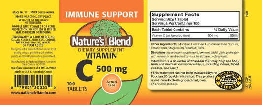 Close-up of Nature's Blend Vitamin C 500 mg 100 tablets bottle and tablets
