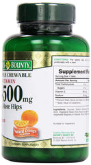 Close-up of orange-flavored C-500 mg chewables with Rose Hips