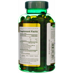 Close-up of flaxseed oil softgels in bottle