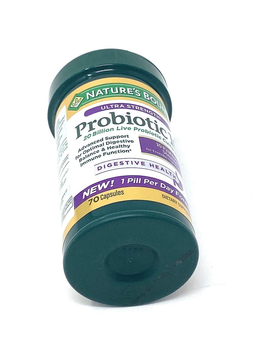 Single probiotic capsule shown next to bottle