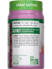 Lifestyle image of a woman taking Nature's Truth collagen gummies