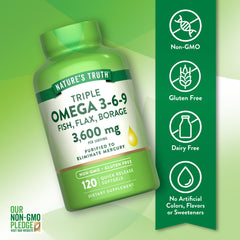 Nature's Truth Omega 3-6-9 softgels being poured for daily use