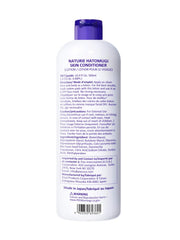 Naturie Hatomugi Skin Conditioner poured into palm for easy application.