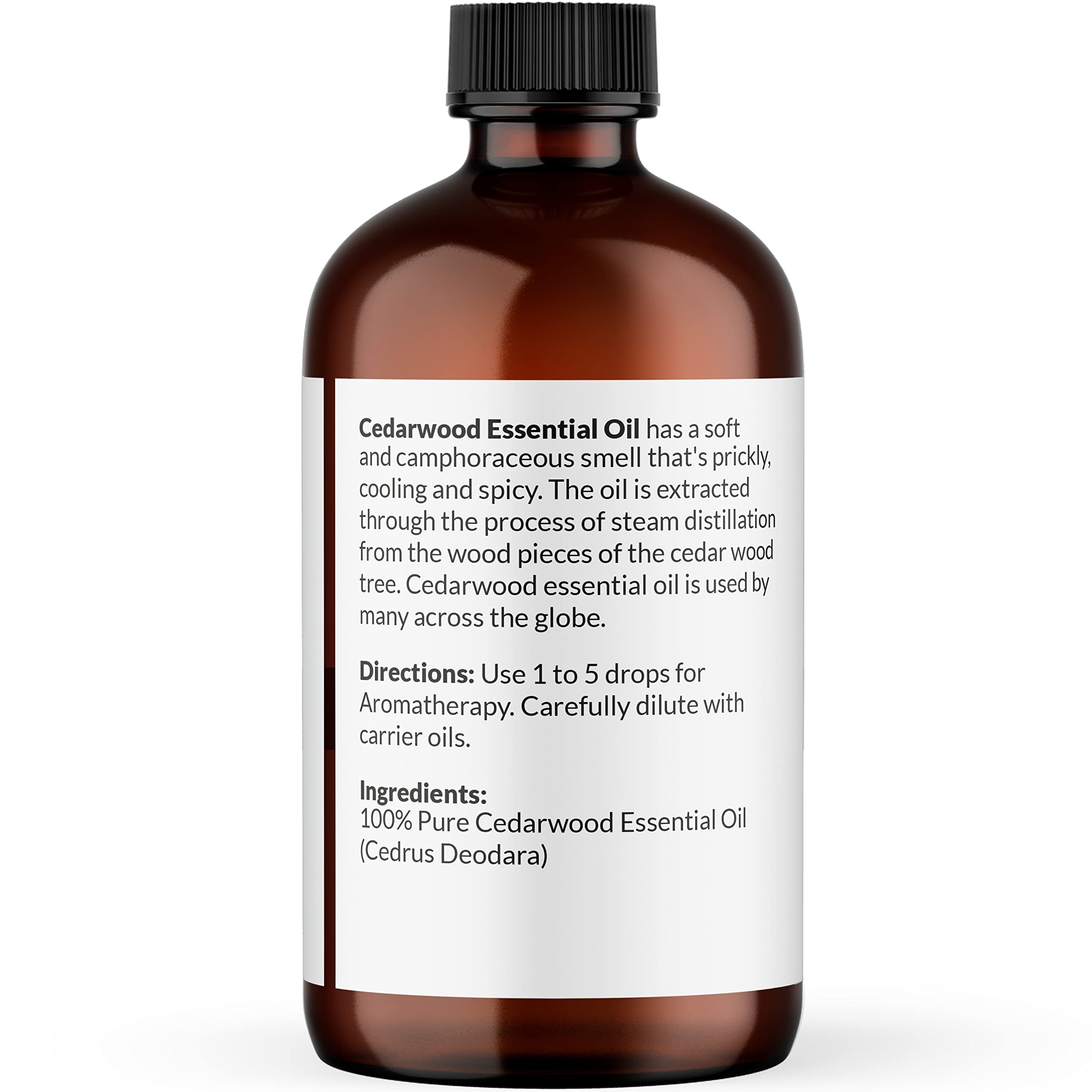 Amber glass bottle of NaturoBliss Cedarwood essential oil with dropper