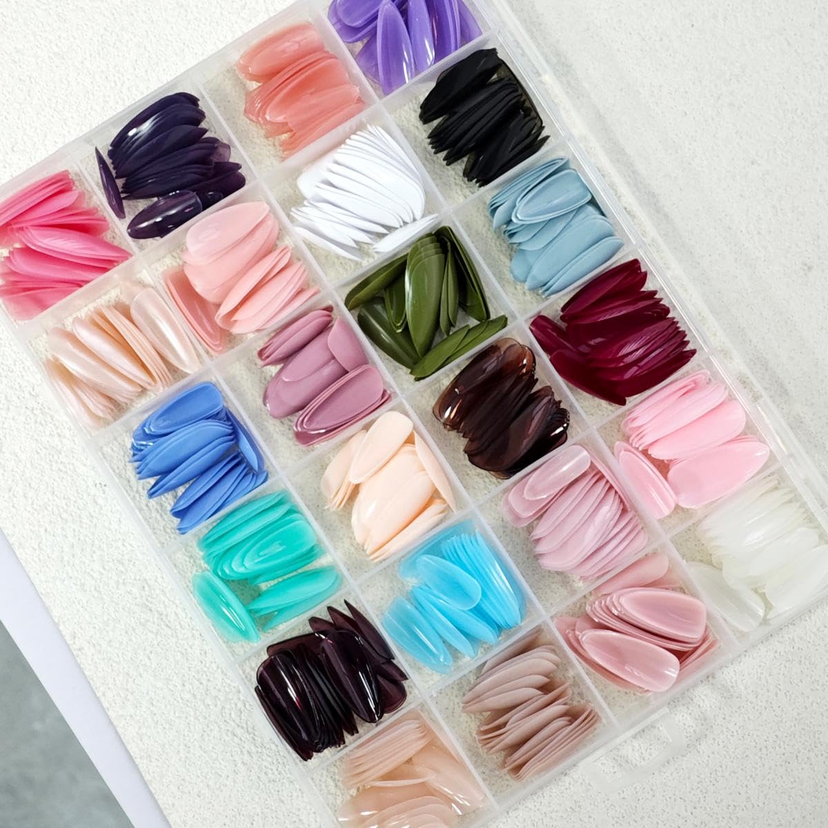 NBNTGH ABS material almond nails offer lightweight durability.