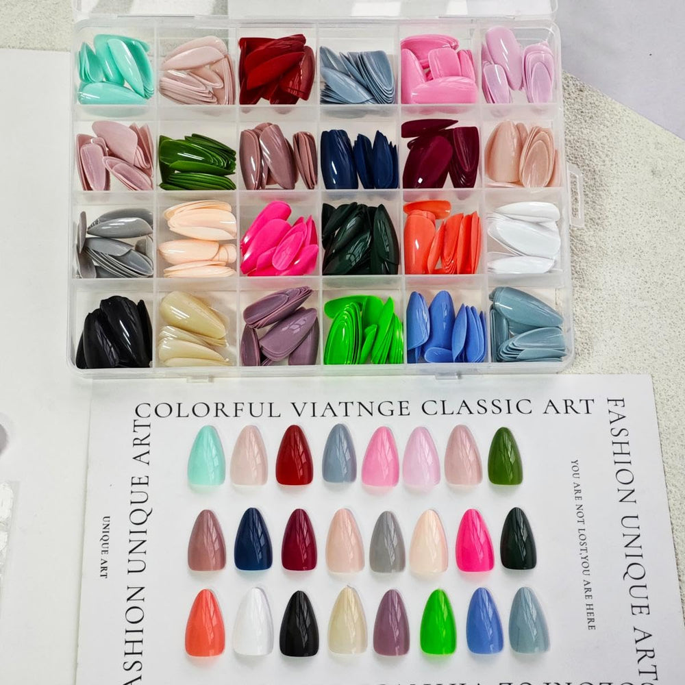 NBNTGH short almond glossy nails ready for quick glam touch-ups.