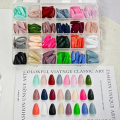 NBNTGH short almond glossy nails ready for quick glam touch-ups.