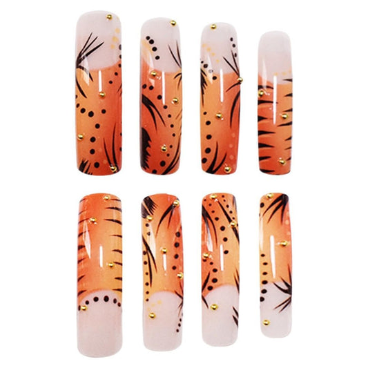 NBNTGH tiger-skin golden design nails add bold style for events and evenings.