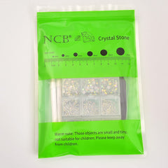 DIY crafting session with crystal glass rhinestones and tools