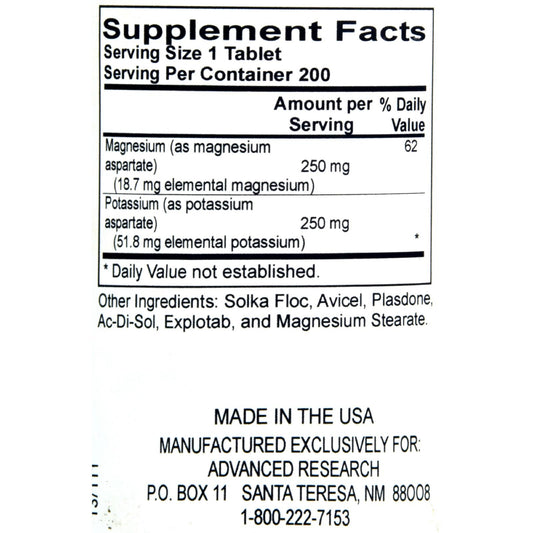 Close-up of potassium magnesium aspartate (K Mg) capsules
