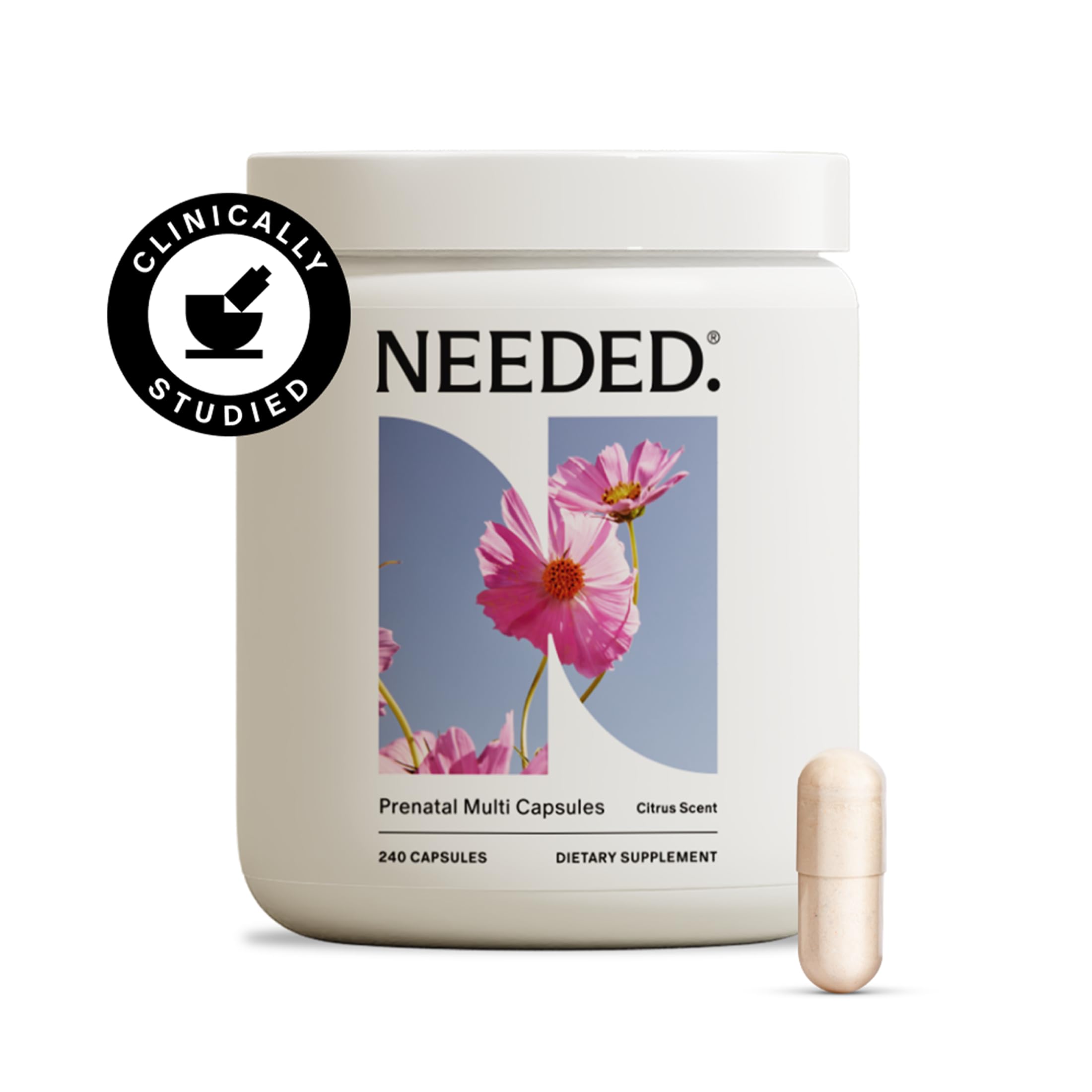 Needed prenatal capsules in hand show easy swallowing with meals.