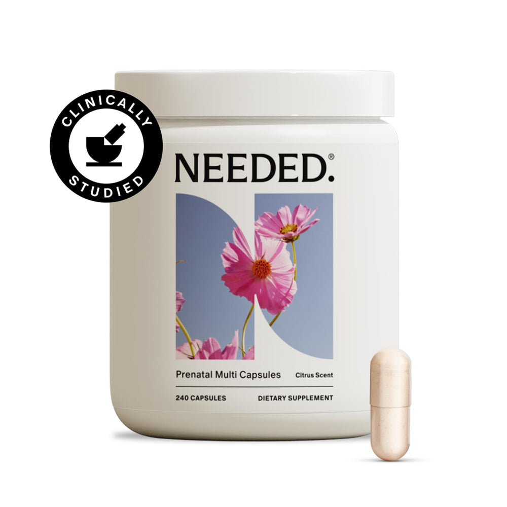 Needed prenatal capsules in hand show easy swallowing with meals.