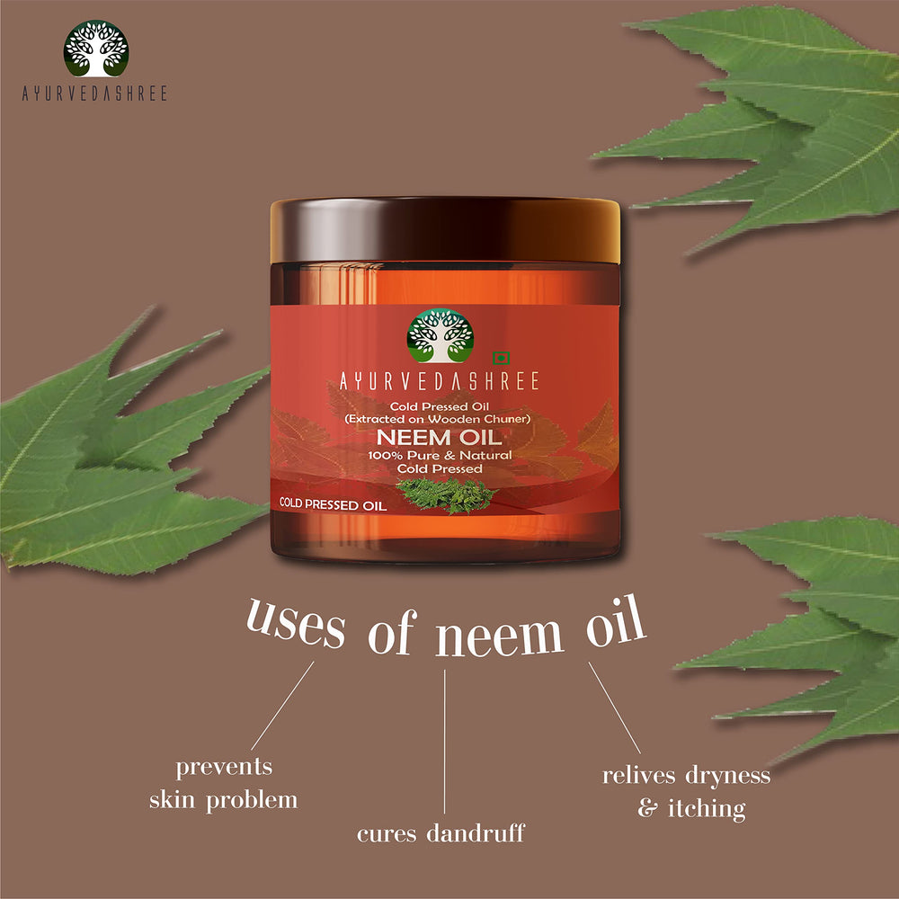 Neem oil being cold pressed on a wooden churner