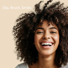 Creamy vanilla orange toothpaste texture close-up