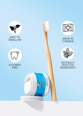 Close-up of Nelson Naturals toothpaste in a glass jar with minty paste