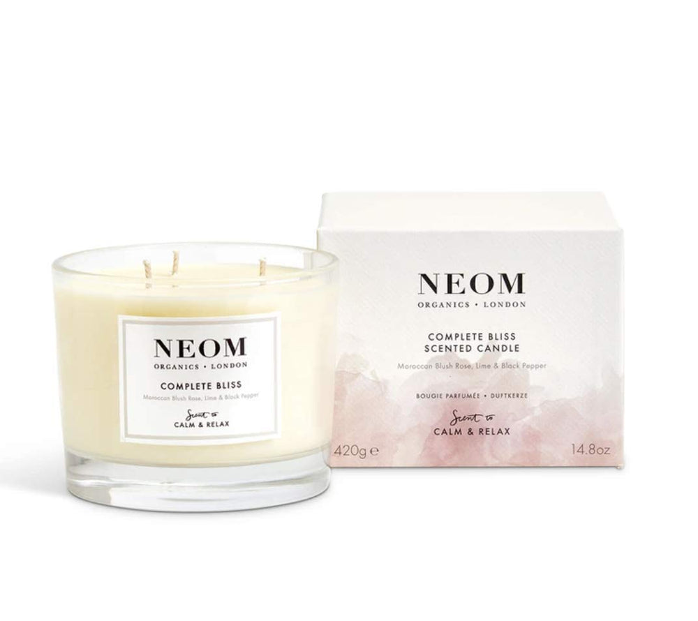 NEOM Complete Bliss 3-wick candle with blush rose, lime and black pepper for calming ambiance.