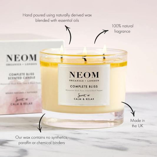 Close-up of NEOM Complete Bliss wicks and natural wax.