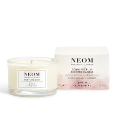 NEOM Complete Bliss travel candle pours a calming blend of blush rose, lime and pepper.