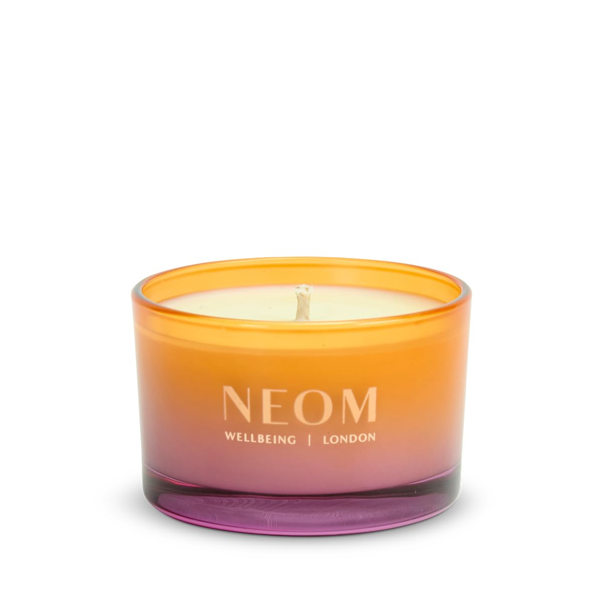 Travel-sized NEOM Cosy Nights Candle beside winter décor (6 of 7)