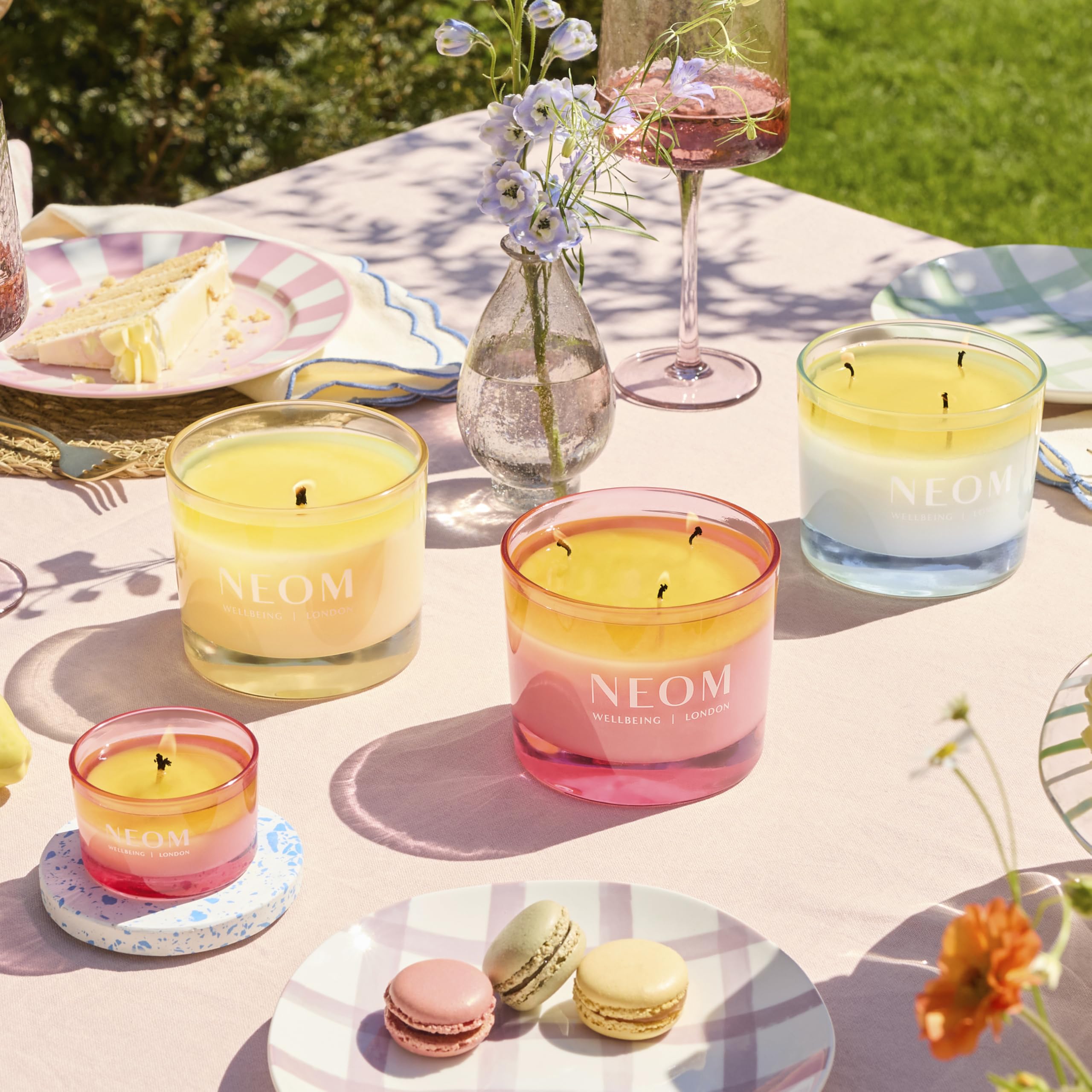 Neom Energy Burst Candle closeup wax texture highlights natural ingredients.