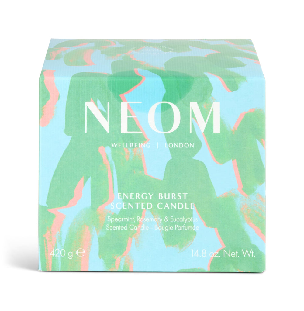 Neom Energy Burst Candle in a bright room supports focus and refreshment.