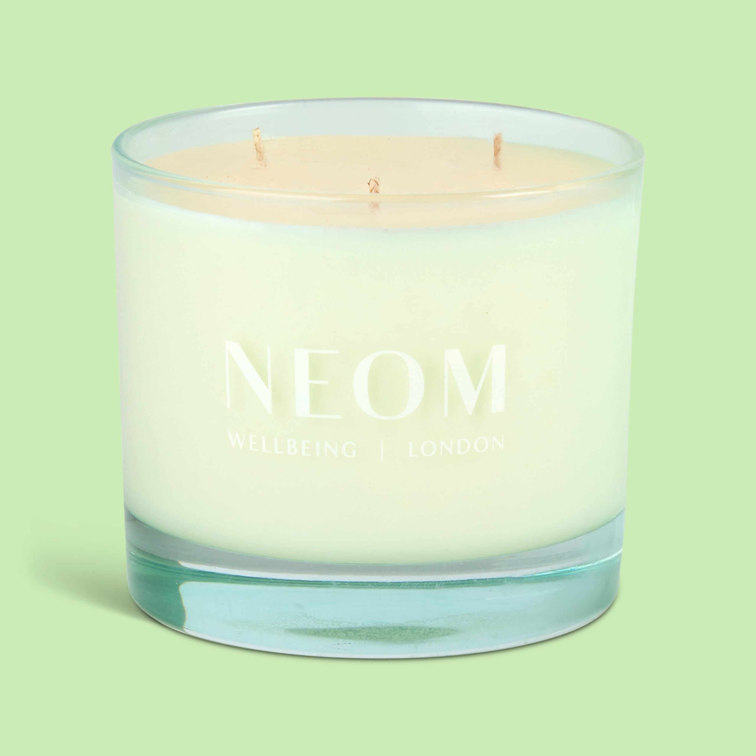 Neom Energy Burst Candle aroma notes of spearmint, rosemary, eucalyptus for energizing mood.
