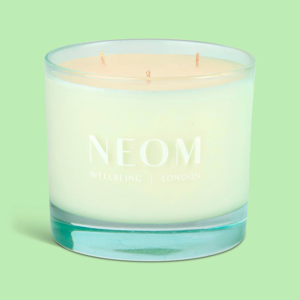 Neom Energy Burst Candle aroma notes of spearmint, rosemary, eucalyptus for energizing mood.