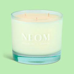 Neom Energy Burst Candle aroma notes of spearmint, rosemary, eucalyptus for energizing mood.