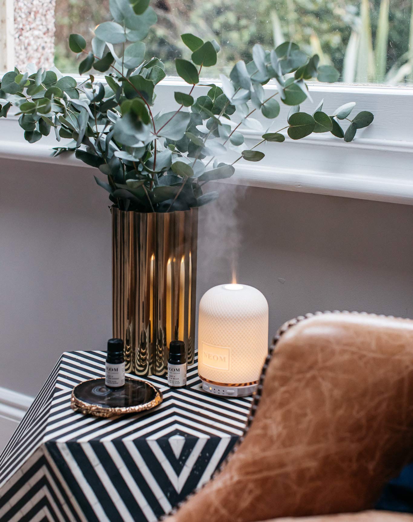 Dropper dispensing NEOM essential oil