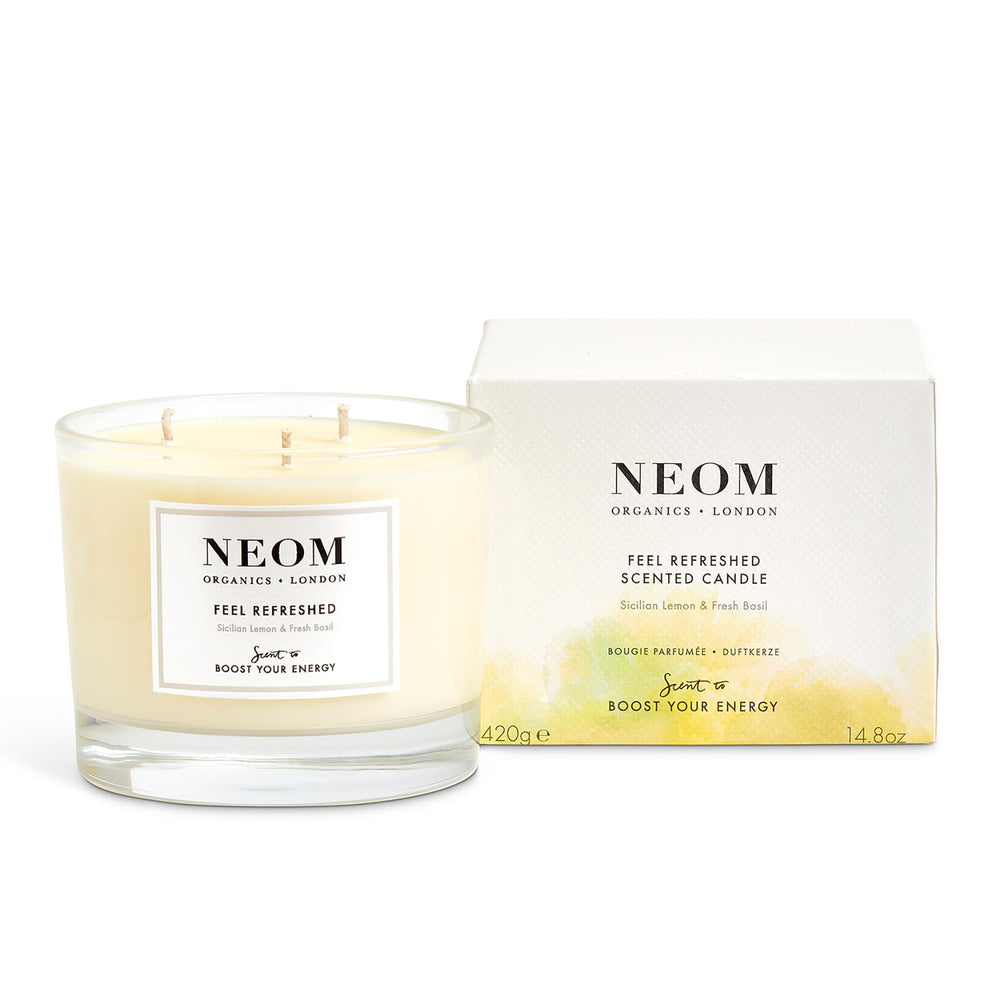 NEOM Feel Refreshed candle closeup with 3-wick setup for even burn and lingering aroma.