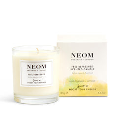 Neom Feel Refreshed candle wax close-up, natural fragrance for energy lift