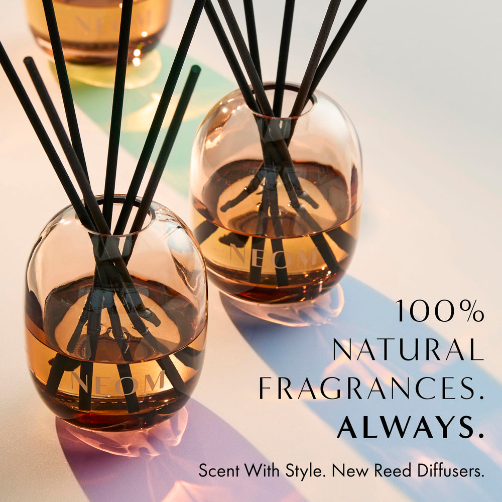 Amber glass NEOM Feel Refreshed diffuser with reeds