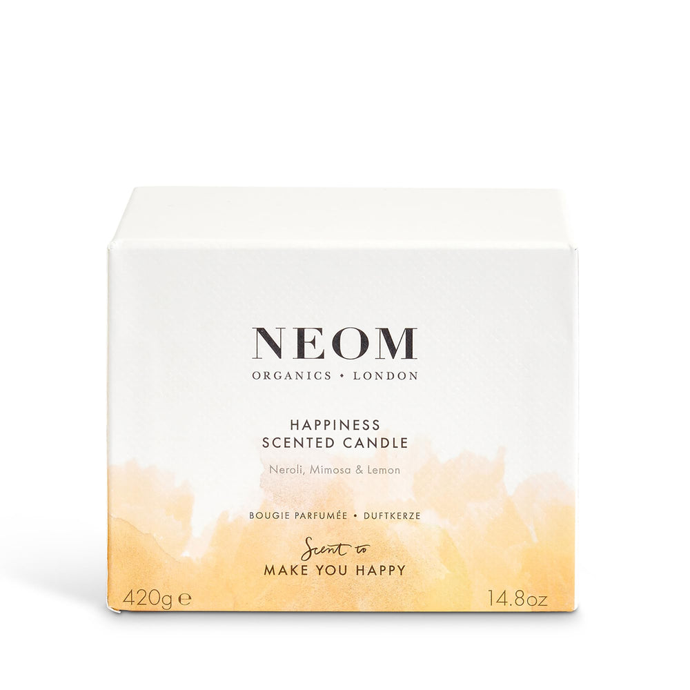 NEOM Happiness candle scent diffusion fills room with fresh citrus notes